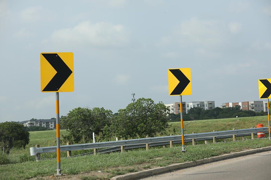 Curve in road signs along highway